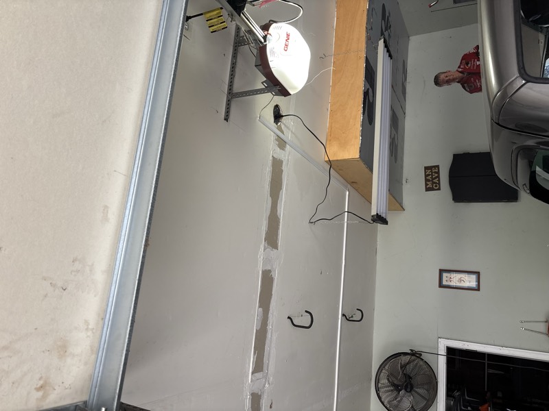 Garage wall with a drywall seam patched and finished