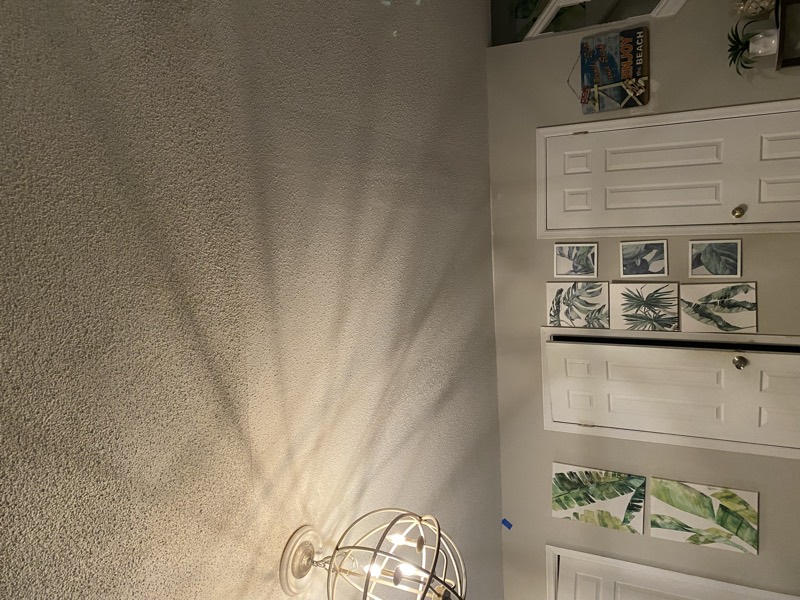 Repaired textured ceiling with a light fixture