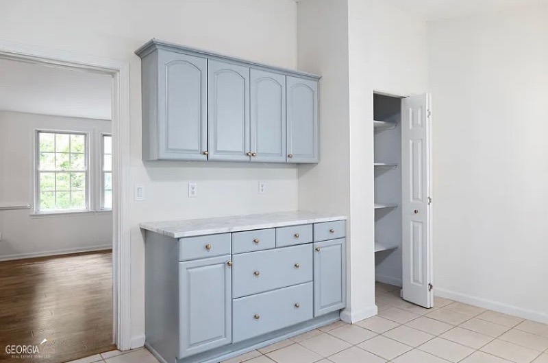 The built-in hutch painted to match the refreshed kitchen