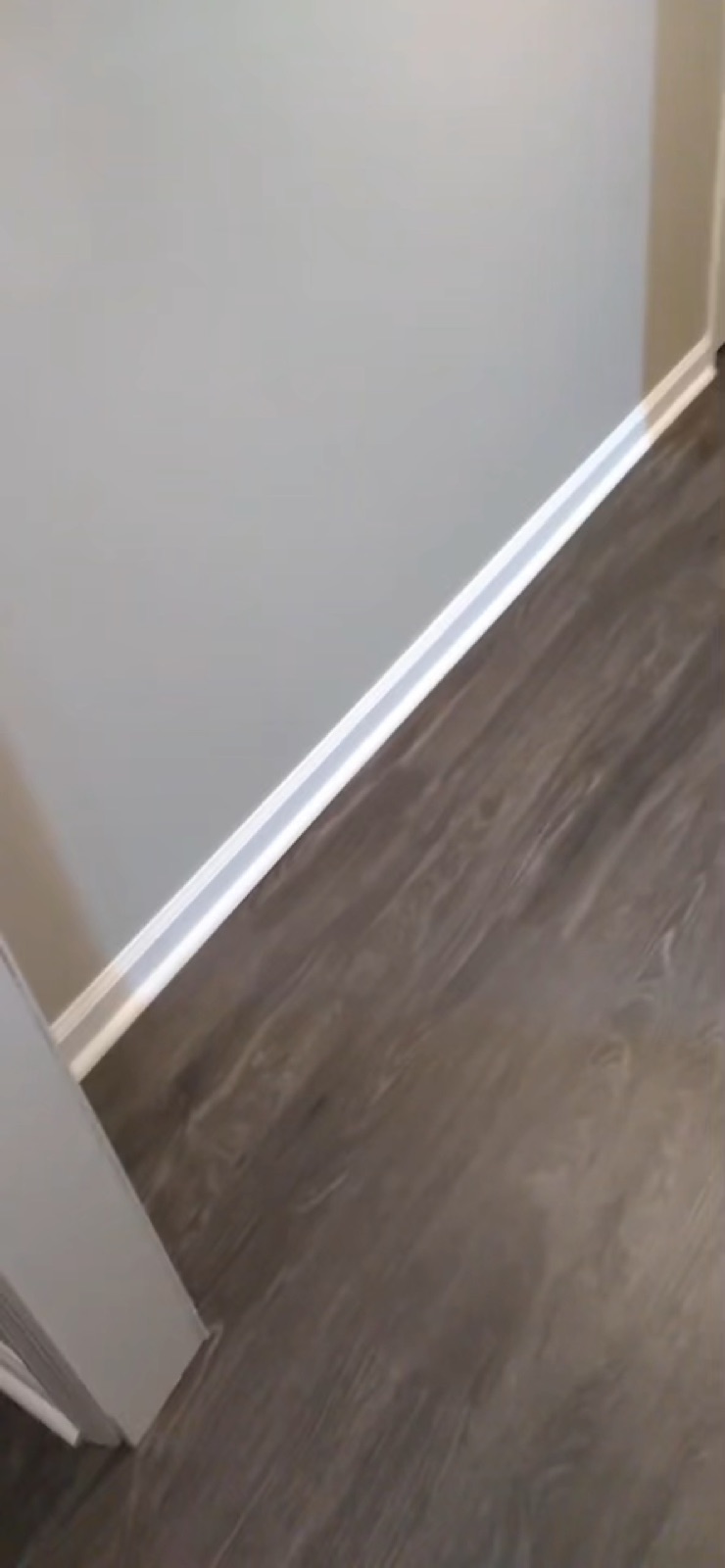 Walkthrough of new flooring and baseboards